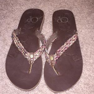 Brown braided flip flops